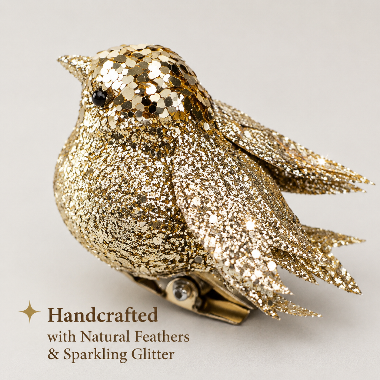 Handcrafted glitter bird ornament closeup