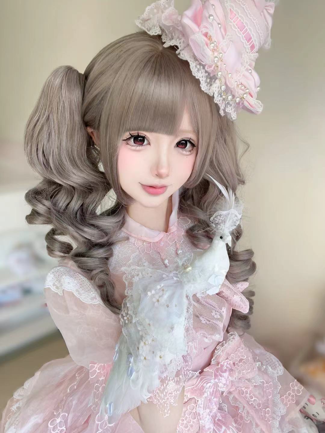 White peacock ring closeup for sweet Lolita styling